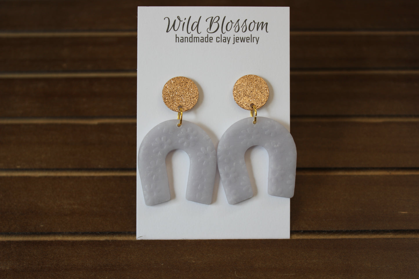 Pale Blue Daisy Horseshoe Earring